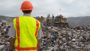 man looking at waste